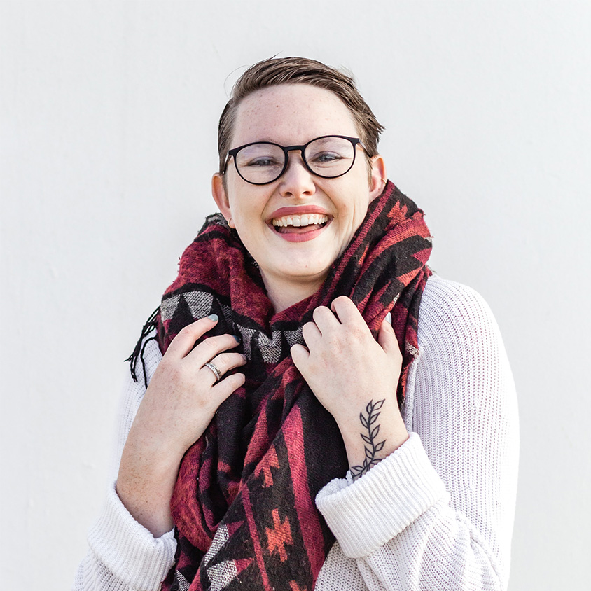 smiling woman with scarf